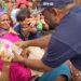 Dr. Anosh Ahmed Distributes Free Meals at Jinnah Hospital in Memory of Late Father